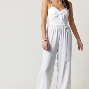 Francesca’s white Pom jumpsuit NWT